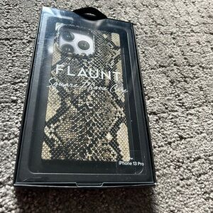 Brand new in box Flaunt Brand iPhone 13pro phone case in neutral snake print.